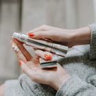 Ultra Marine Collagen Night Cream image of cream on fingers. skin-rg