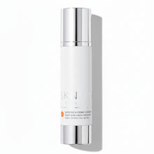 Skin-rg Super Rich Creme Cleanser Skincare bottle with silver cap and white body on a white background.