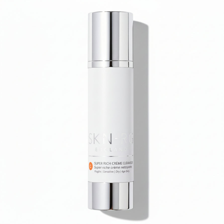 Skin-rg Super Rich Creme Cleanser Skincare bottle with silver cap and white body on a white background.