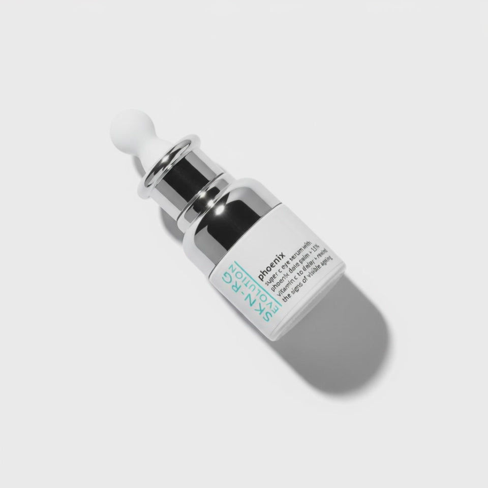 www.skin-g.com Phoenix Super C Face and Eye Serum with Tetra C and anti ageing line and wrinkle reduction Phoniex Date Palm extract. Botle on white with light energising coming from whithin.