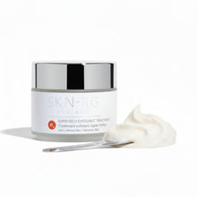 Skin-rg Organics Super Rich Exfoliant Treatment texture shot with Reishi Mushroom and black cohosh on white background and jojoba spheres.