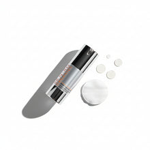 Skin-rg Skincare Skincare Cellular Balance Toner bottle with silver cap on a white background 30ml with toner pad and droplets.