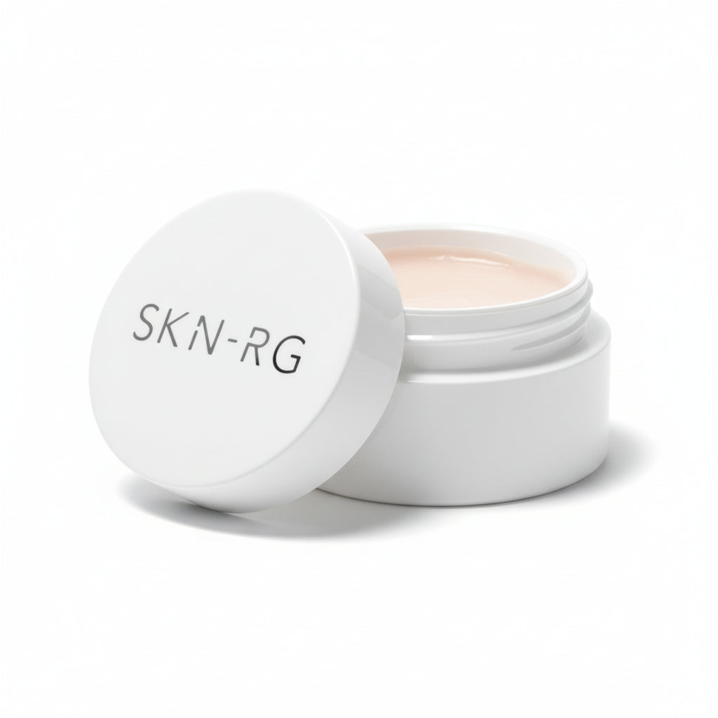 White jar with Pure Shield SPF 30 Adaptive Skin Tint with 'SKIN-RG' branding on a white background