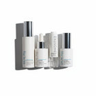 www.skin-rg.com The Reconstructor AM Dermal System, a 4-step skincare set with white bottles and silver caps.