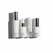 www.skin-rg.com The Reconstructor AM Dermal System, a 4-step skincare set with white bottles and silver caps.